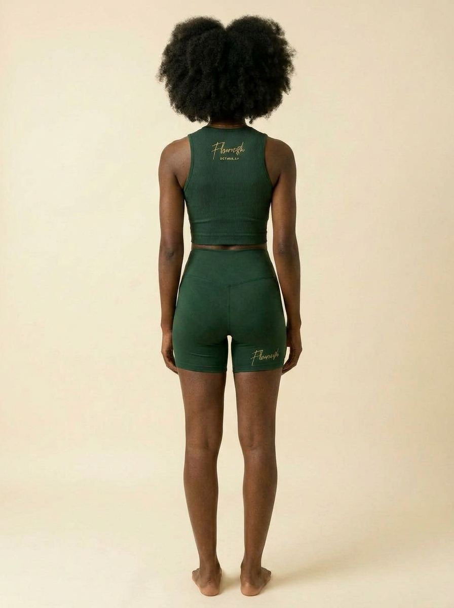 Back view of the Flouri$h Biker Set in Forest on the same model, showing the upper-back script